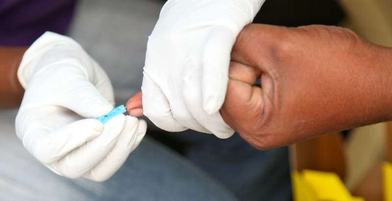 Twist top lancet use for blood withdrawal