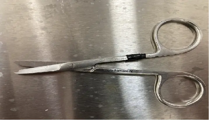Suture scissors used to cut suture material