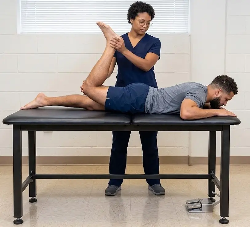 Femoral nerve stretch test with prone knee flexion and hip extension.