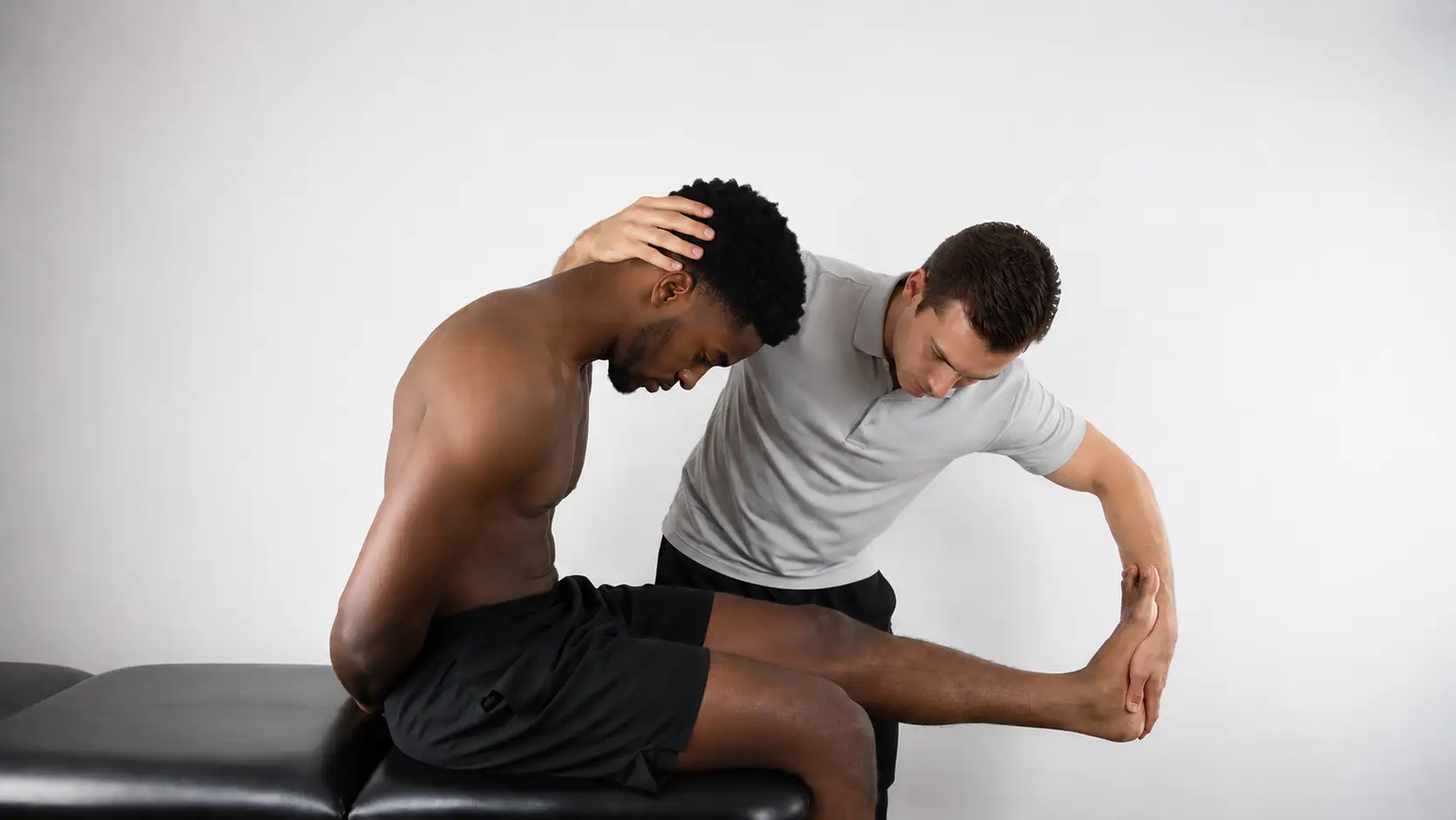 Slump test with cervical flexion and knee extension.