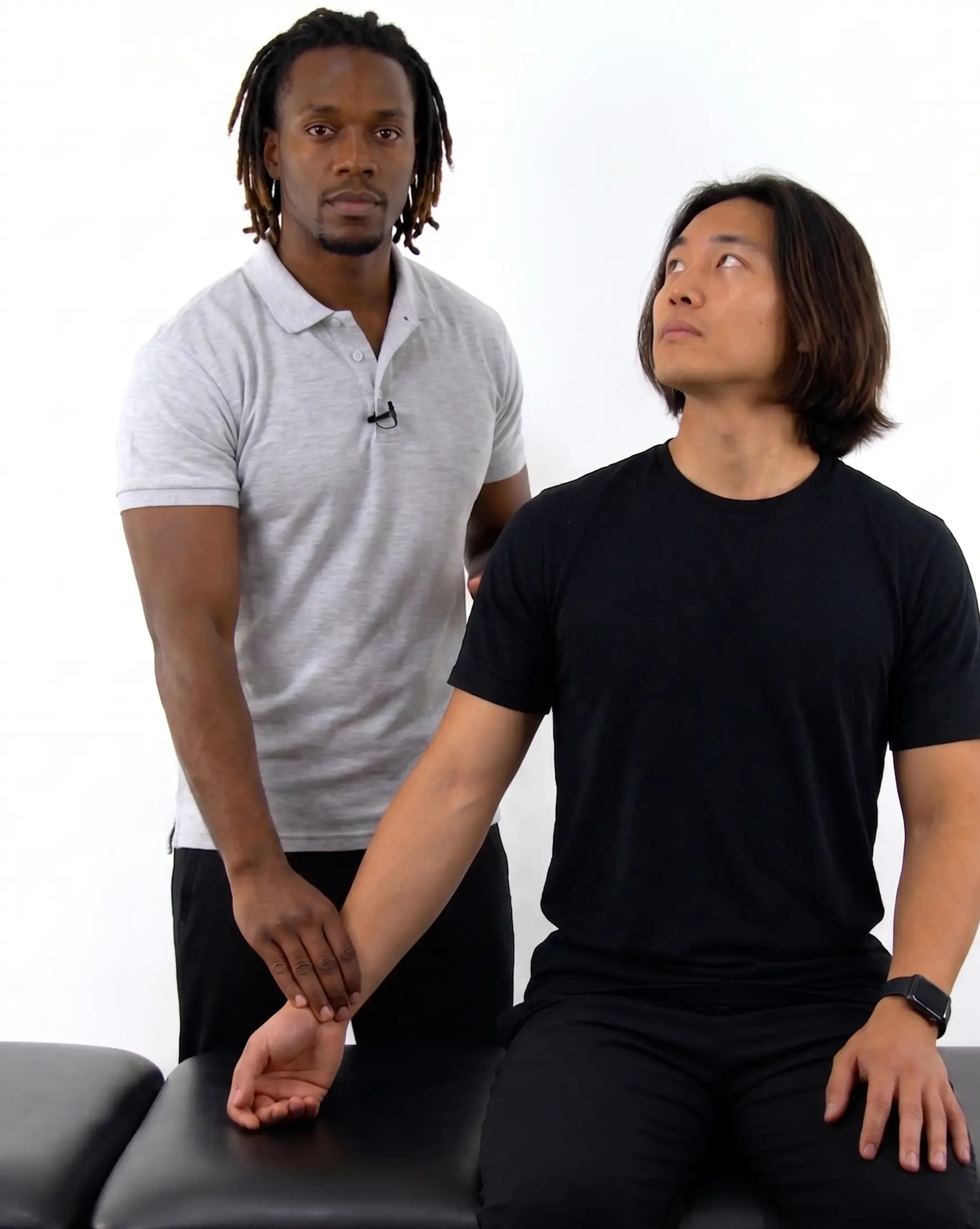 Adson's test for thoracic outlet syndrome with the arm extended and the head rotated toward the tested side.